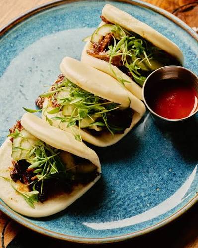 Fahrenheit Charlotte signature dishes Ahi Poke Nachos
American Wagyu Short Rib Steam Buns
Dynamite Rock Shrimp